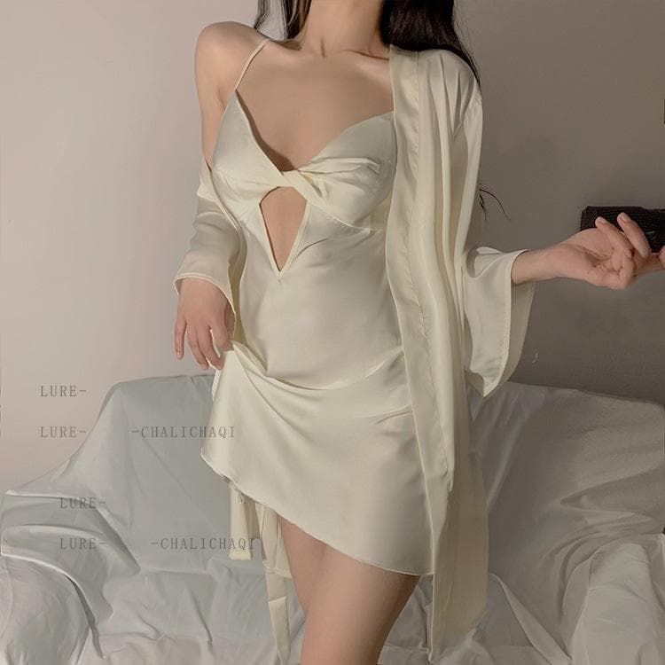 V05 (CÓ ĐỆM) Váy lụa nơ xoắn QC