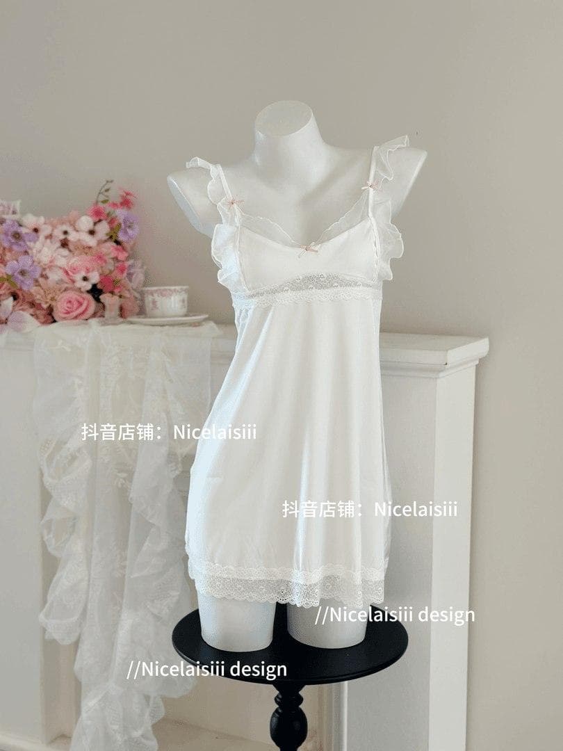 V11 Váy lụa cánh tiên ren nơ QC